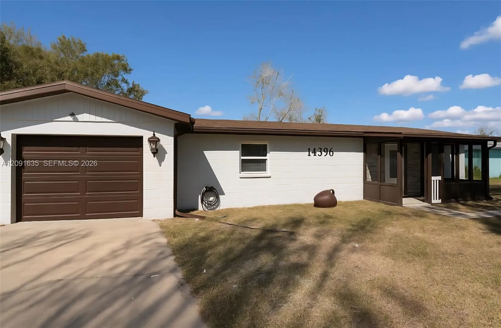 Foto de propiedad en 14396 Pambar Avenue, Port Charlotte, FL 33953 Port Charlotte con MLS# 