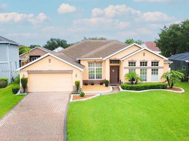 Foto de propiedad en 14531 Riviera Pointe Drive, Orlando, FL 32828 Orlando con MLS# 