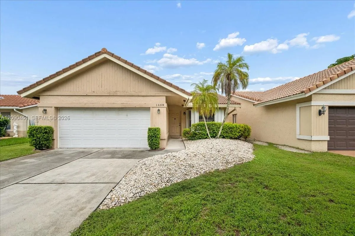Foto de propiedad en 1459 NW 97th Terrace, Coral Springs, FL 33071 Coral Springs con MLS# 