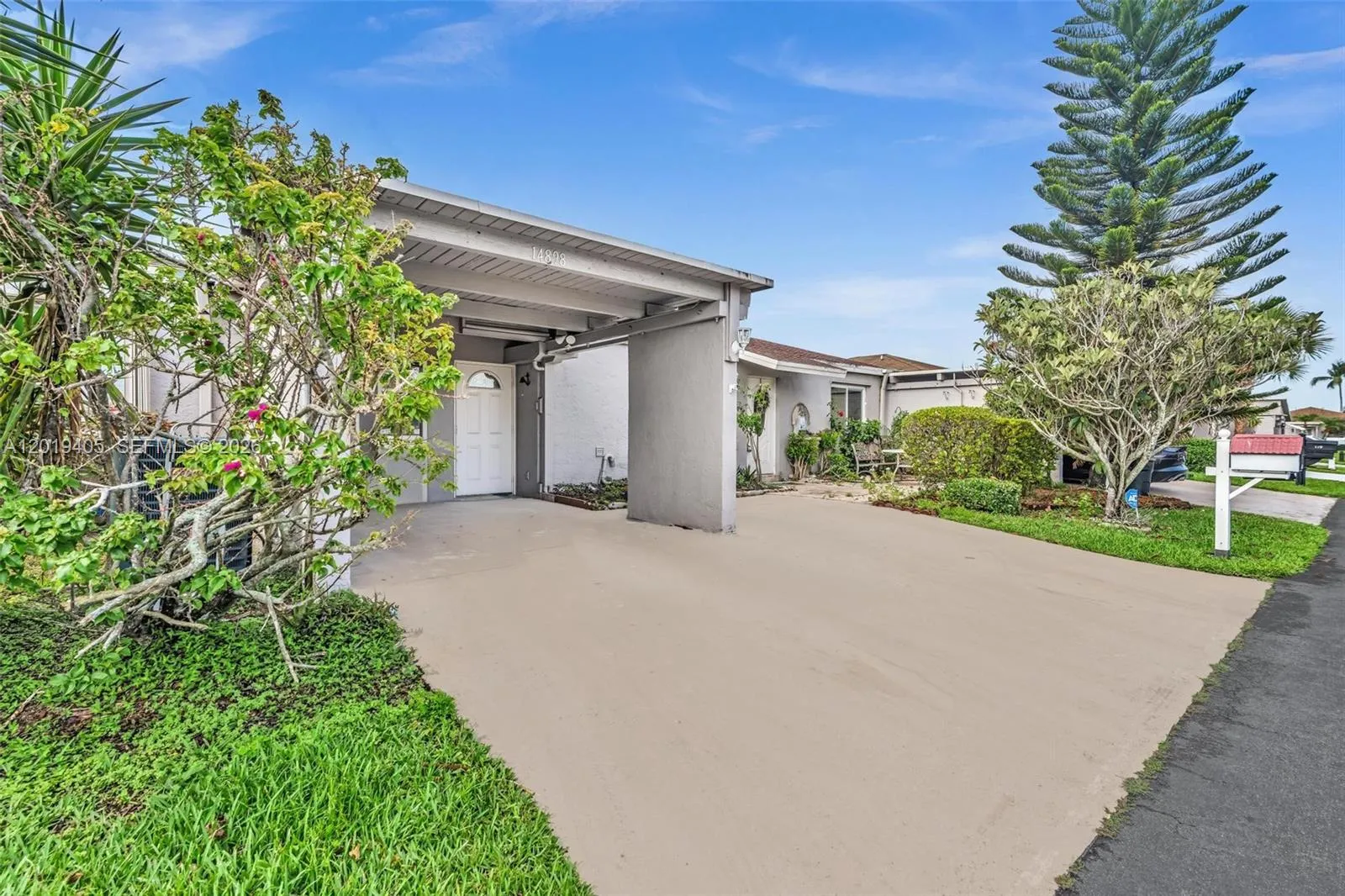 Foto de propiedad en 14898 Wildflower Lane, Delray Beach, FL 33446 Delray Beach con MLS# 