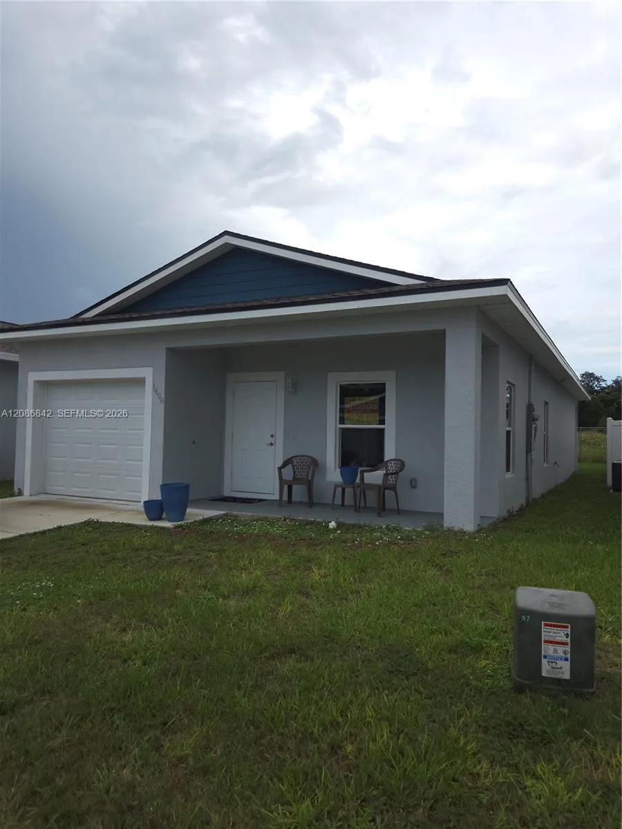 Foto de propiedad en 1498 Las Villa Boulevard, FL 33870  con MLS# 