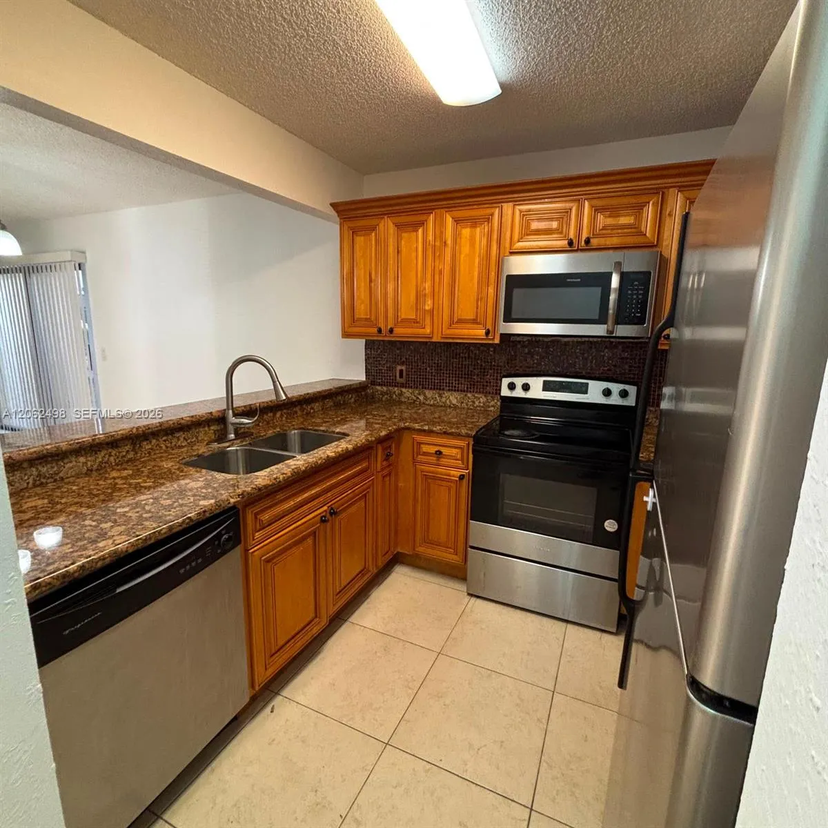 Foto de propiedad en 1502 Lake Crystal Drive A, West Palm Beach, FL 33411 West Palm Beach con MLS# 