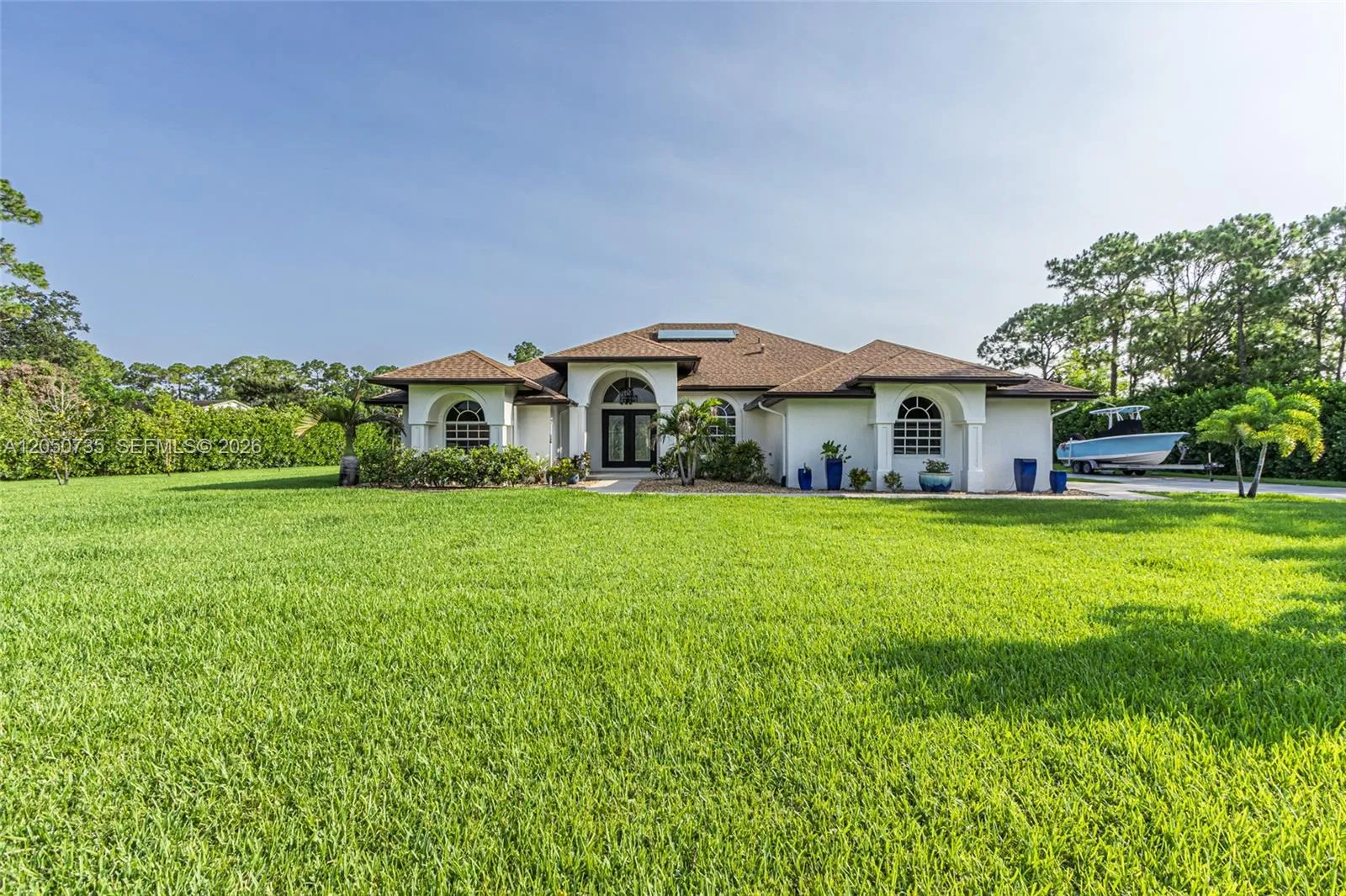 Foto de propiedad en 15397 N 66th Court N, Loxahatchee, FL 33470 Loxahatchee con MLS# 