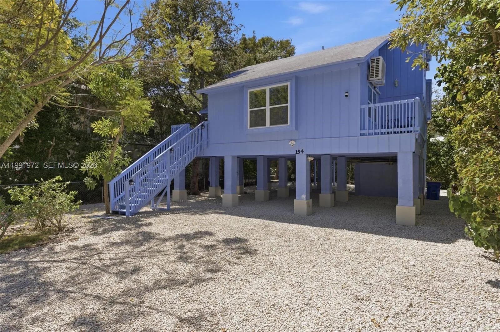 Foto de propiedad en 154 Sebring Drive, Tavernier, FL 33070 Tavernier con MLS# 