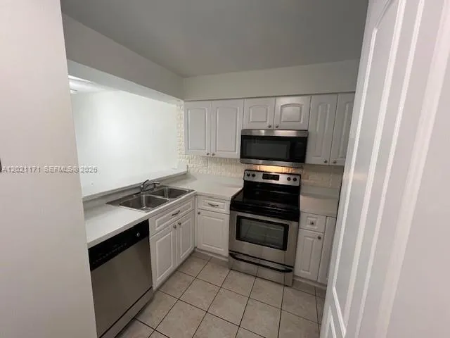 Foto de propiedad en 15405 N Miami Lakeway N 107-1 107-1, Miami Lakes, FL 33014 Miami Lakes con MLS# 