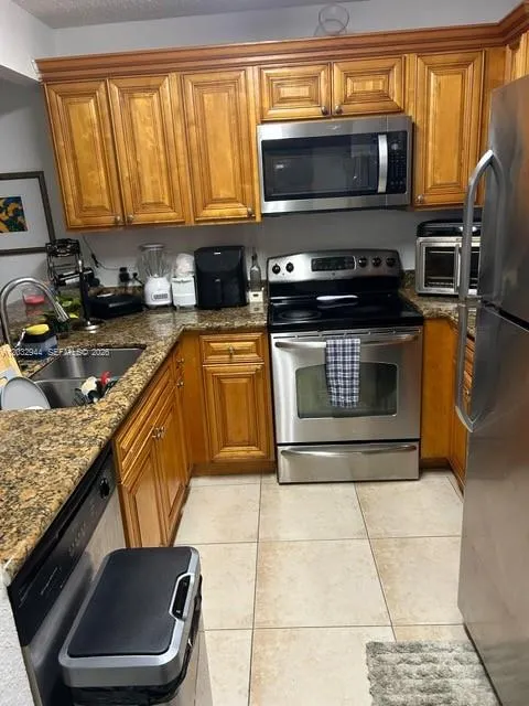 Foto de propiedad en 1561 Balfour Point Drive A, West Palm Beach, FL 33411 West Palm Beach con MLS# 