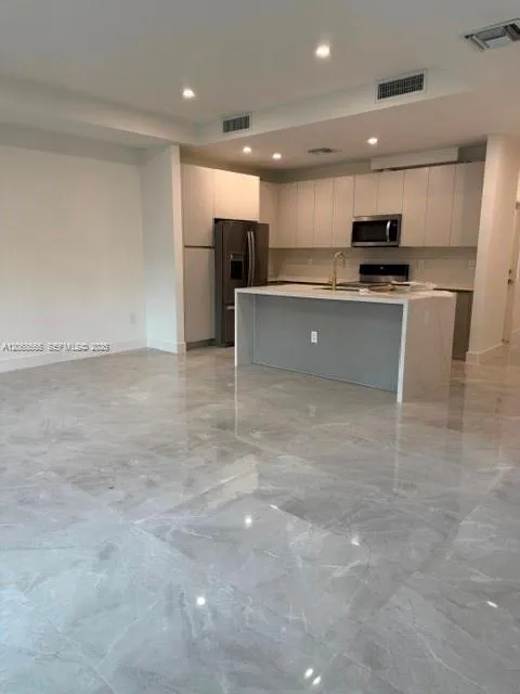 Foto de propiedad en 1571 NW 94th Way 1, Coral Springs, FL 33071 Coral Springs con MLS# 