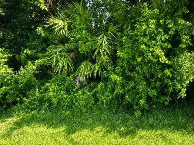 Foto de propiedad en 1585 SW Mullinax Avenue, Port St. Lucie, FL 34953 Port St. Lucie con MLS# 
