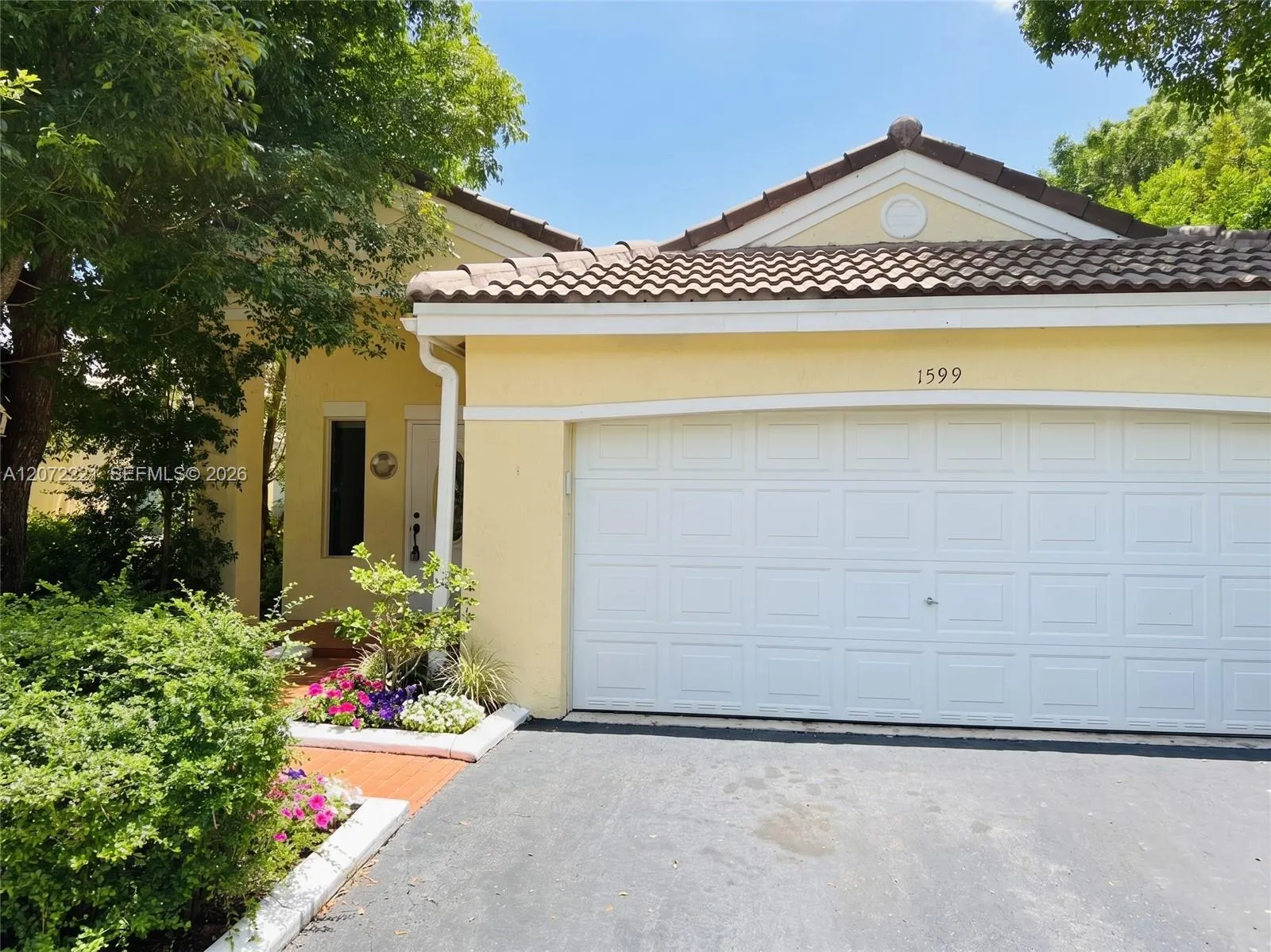 Foto de propiedad en 1599 Palermo Drive, Weston, FL 33327 Weston con MLS# 