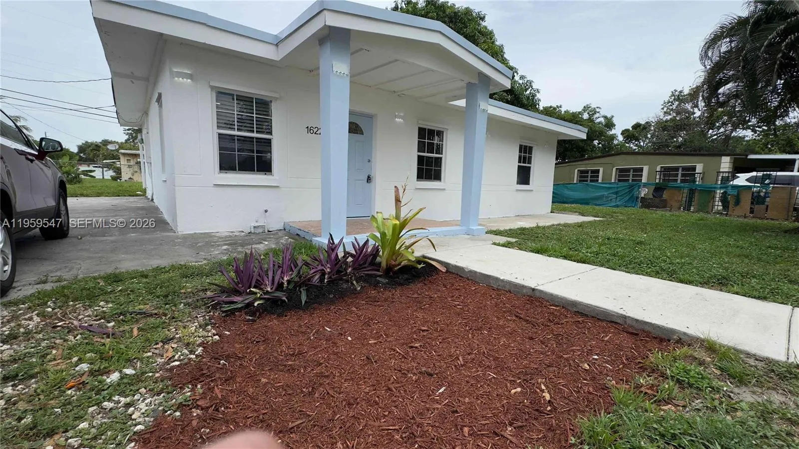 Foto de propiedad en 16221 E Bunche Park Drive, Miami Gardens, FL 33054 Miami Gardens con MLS# 