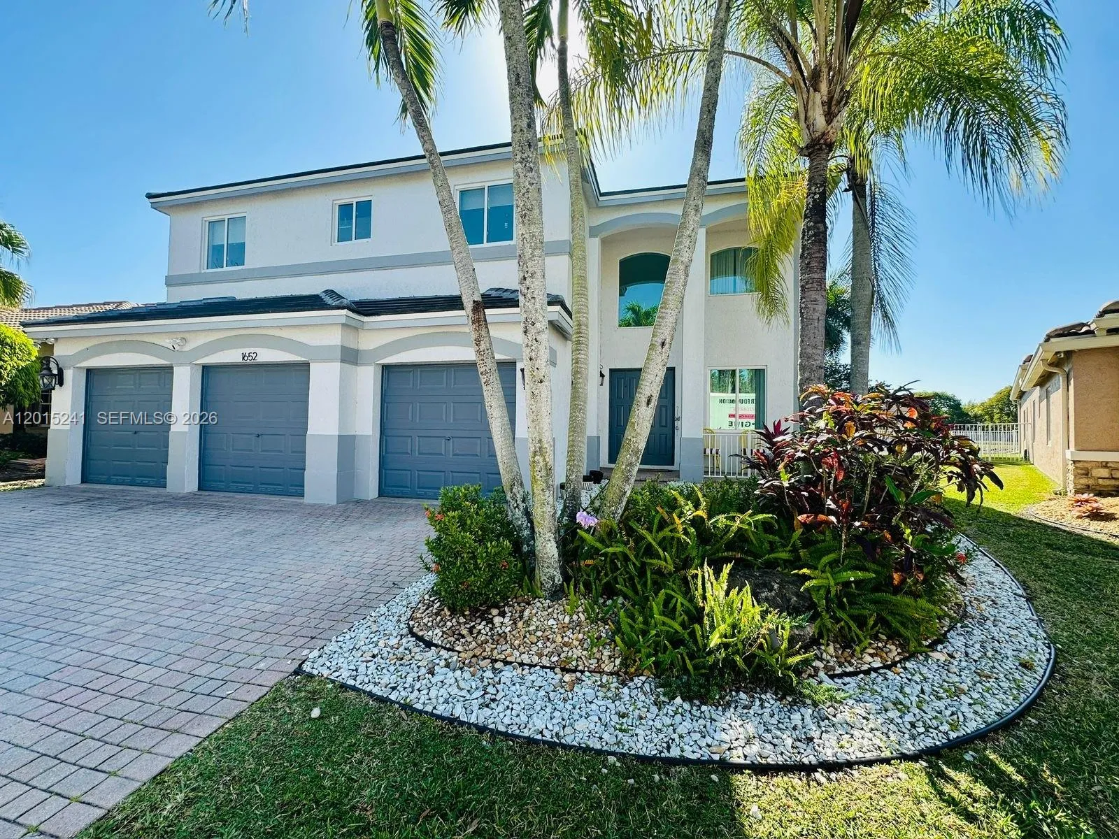 Foto de propiedad en 1652 Orchid Bend, Weston, FL 33327 Weston con MLS# 