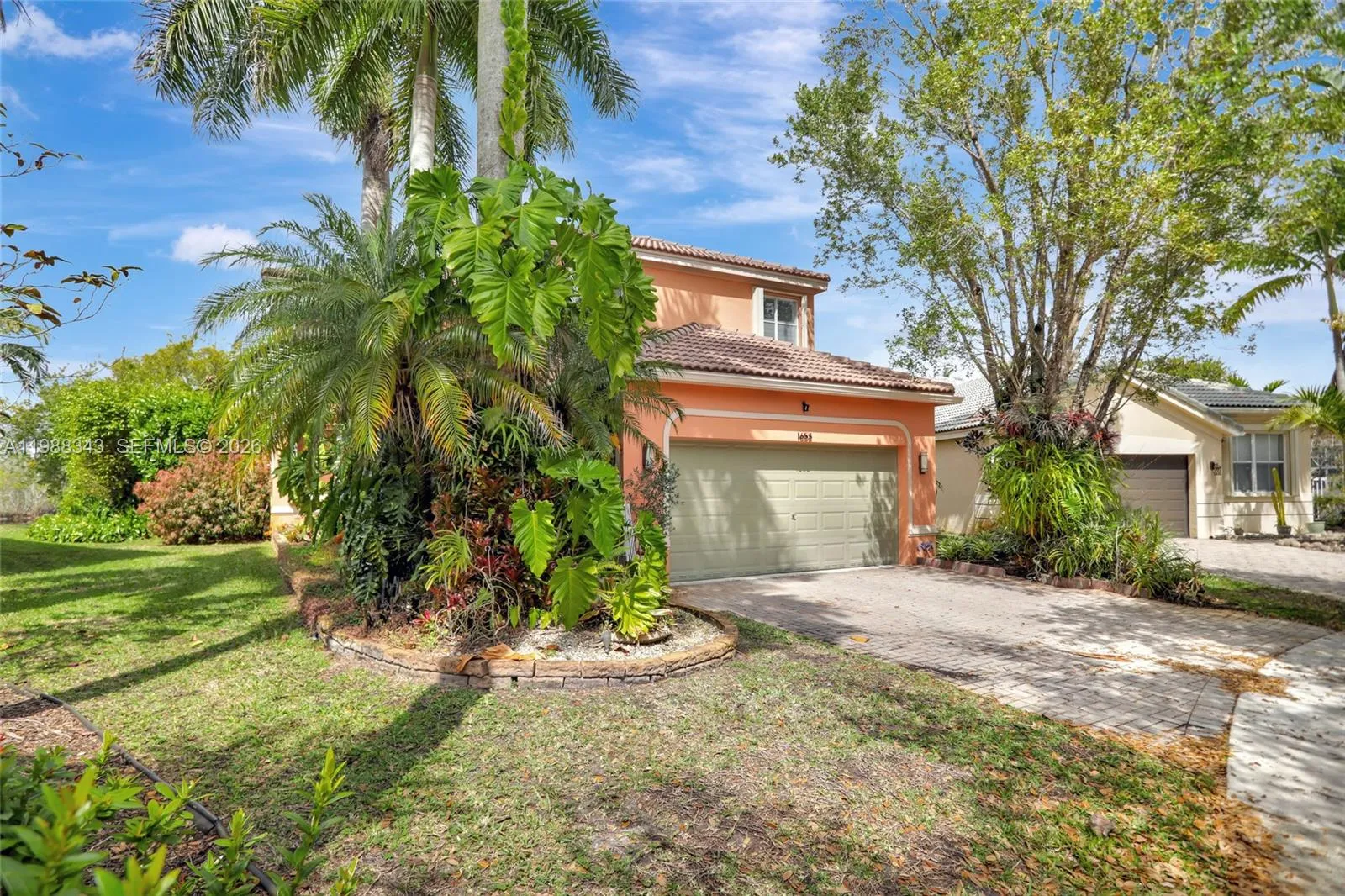 Foto de propiedad en 1653 Winterberry Lane, Weston, FL 33327 Weston con MLS# 