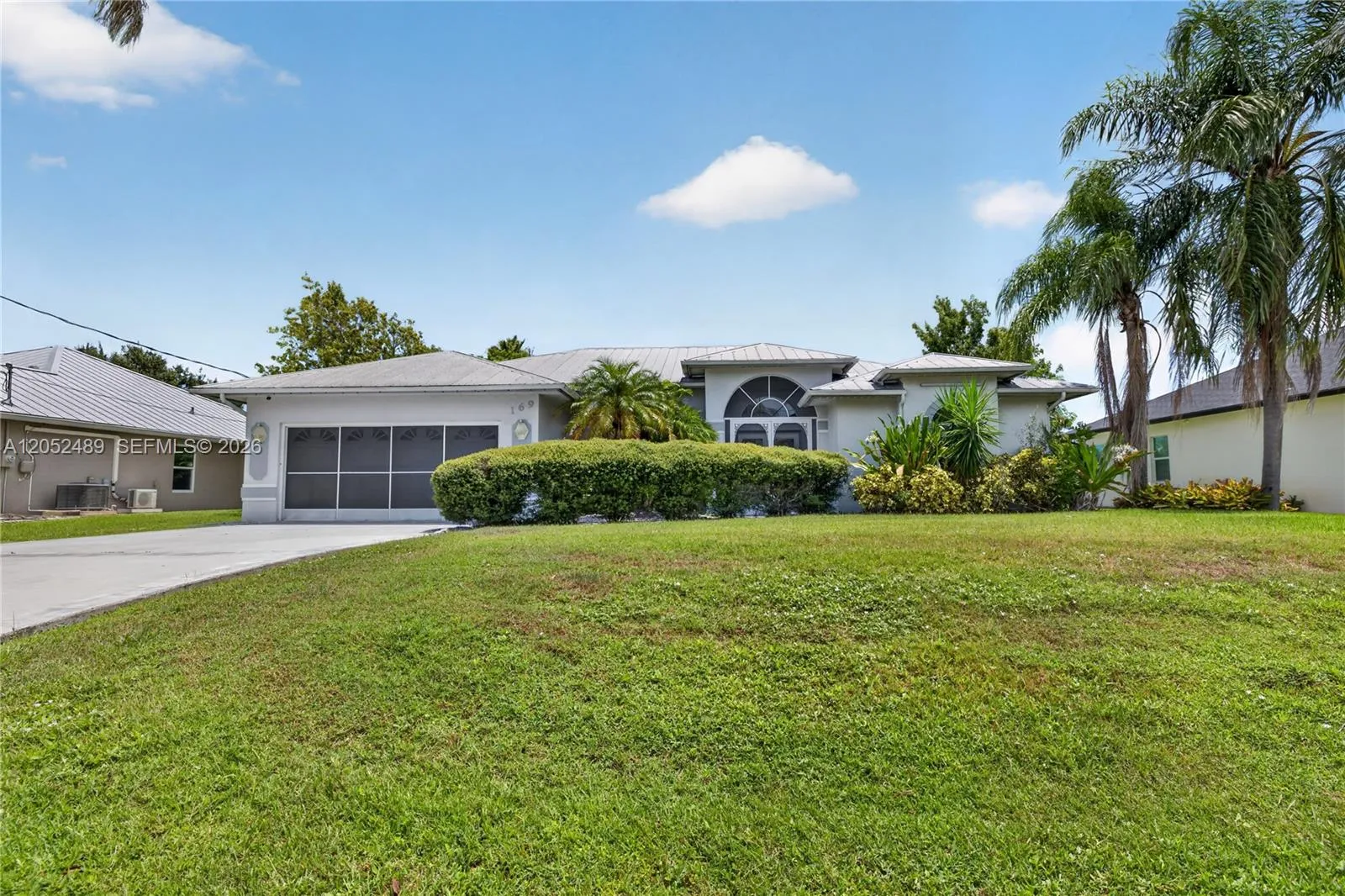 Foto de propiedad en 169 SE Whitmore Drive, Port St. Lucie, FL 34984 Port St. Lucie con MLS# 