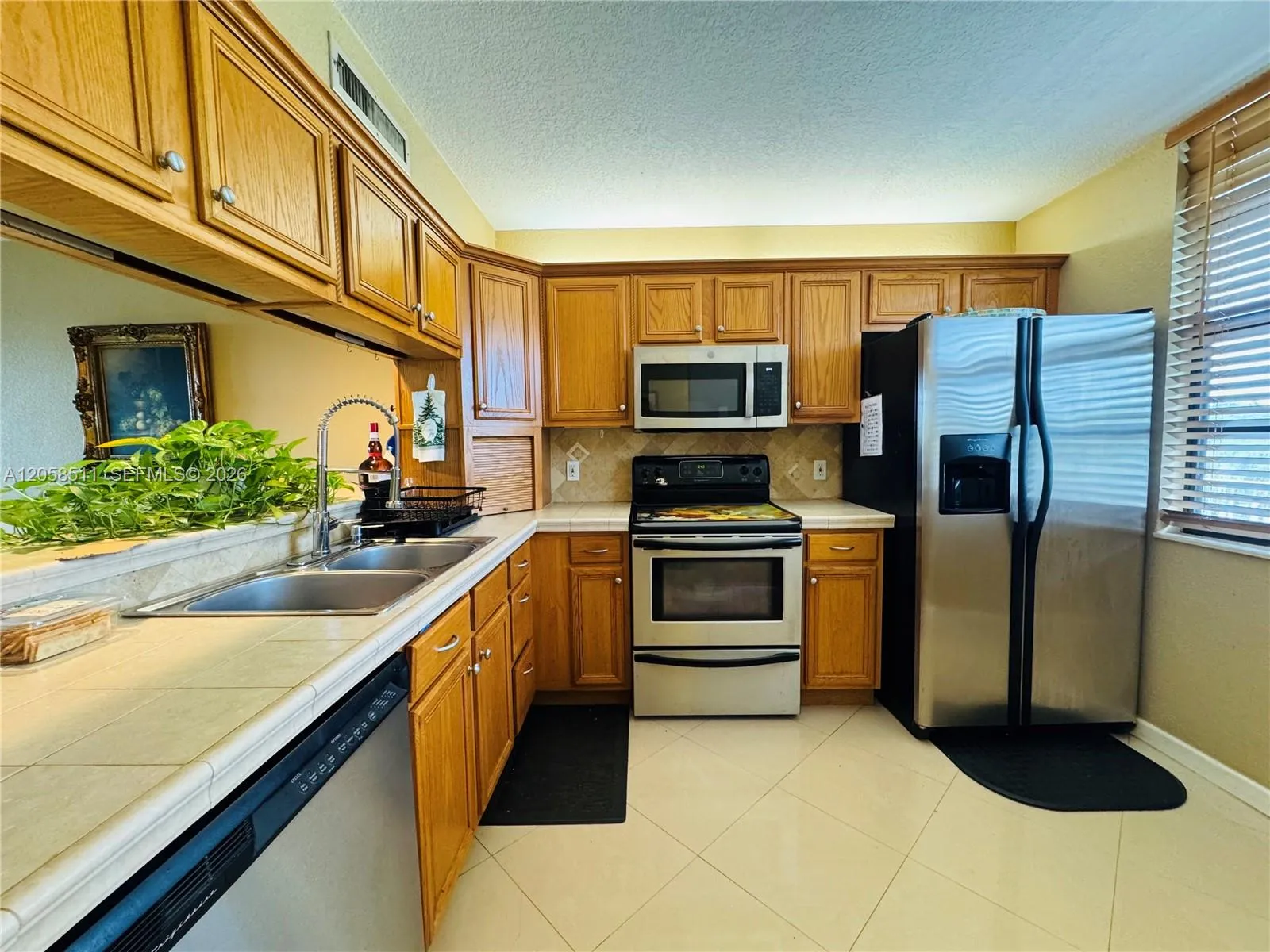 Foto de propiedad en 1705 Whitehall Drive 401, Davie, FL 33324 Davie con MLS# 
