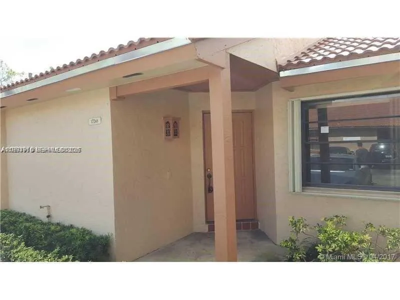 Foto de propiedad en 17268 NW 60th Court, Hialeah, FL 33015 Hialeah con MLS# 