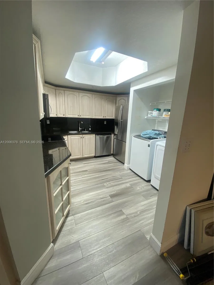 Foto de propiedad en 17405 NW 75th Place 107, Hialeah, FL 33015 Hialeah con MLS# 