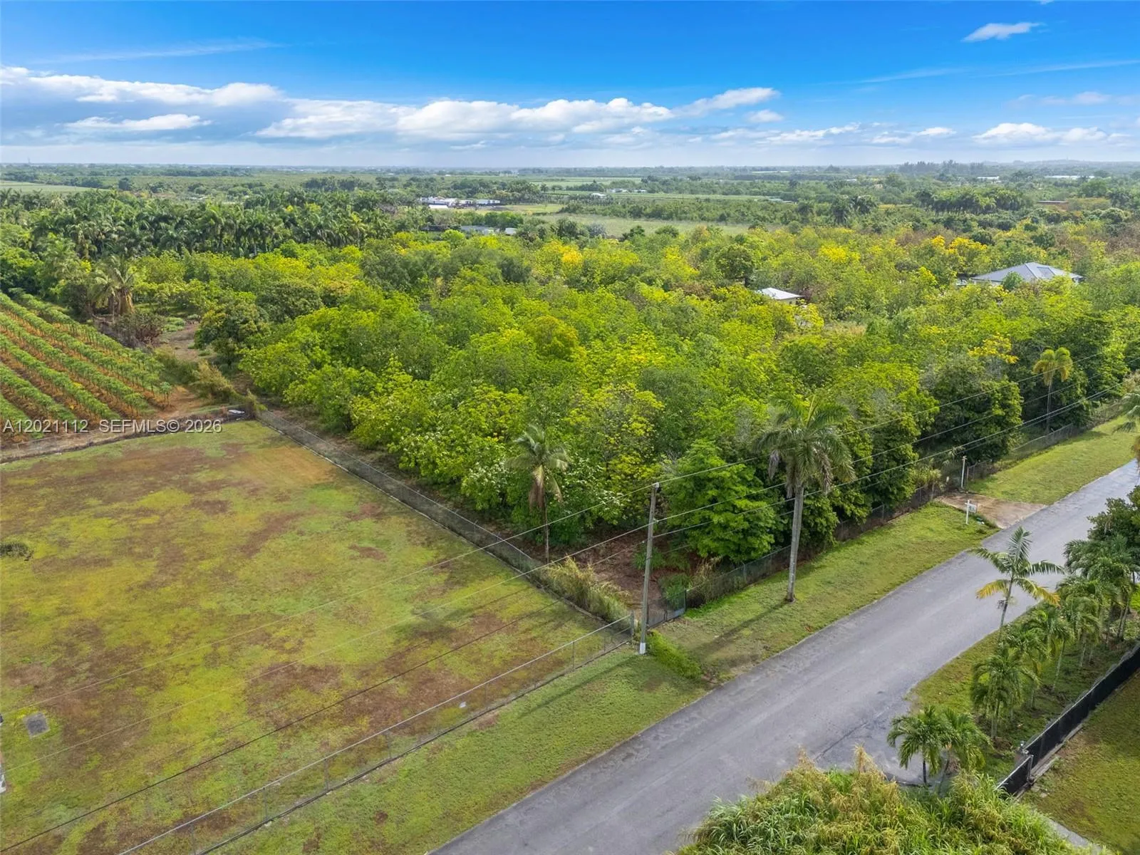FENCED 4.735 ACRES OF MAMAY ON THE RENOWNED SW 182 STREET EAST OF KROME 300 FEET OFF KROME AVE