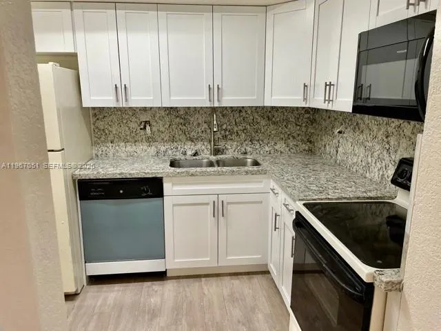 Foto de propiedad en 1754 NW 55th Avenue 102, Lauderhill, FL 33313 Lauderhill con MLS# 