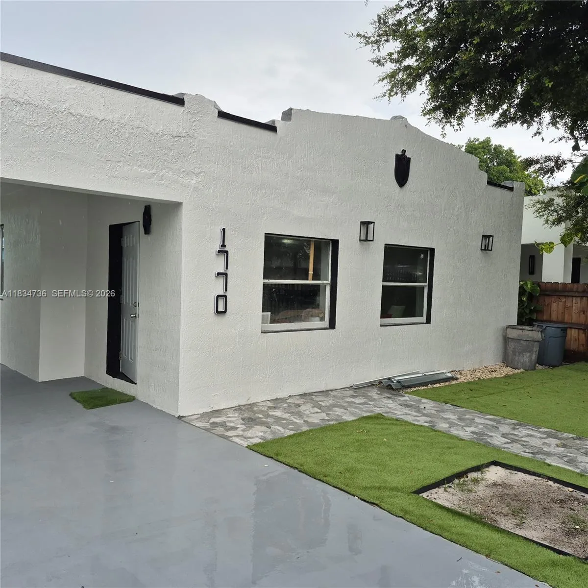 Foto de propiedad en 1770 NW 44th Street, Miami, FL 33142 Miami con MLS# 
