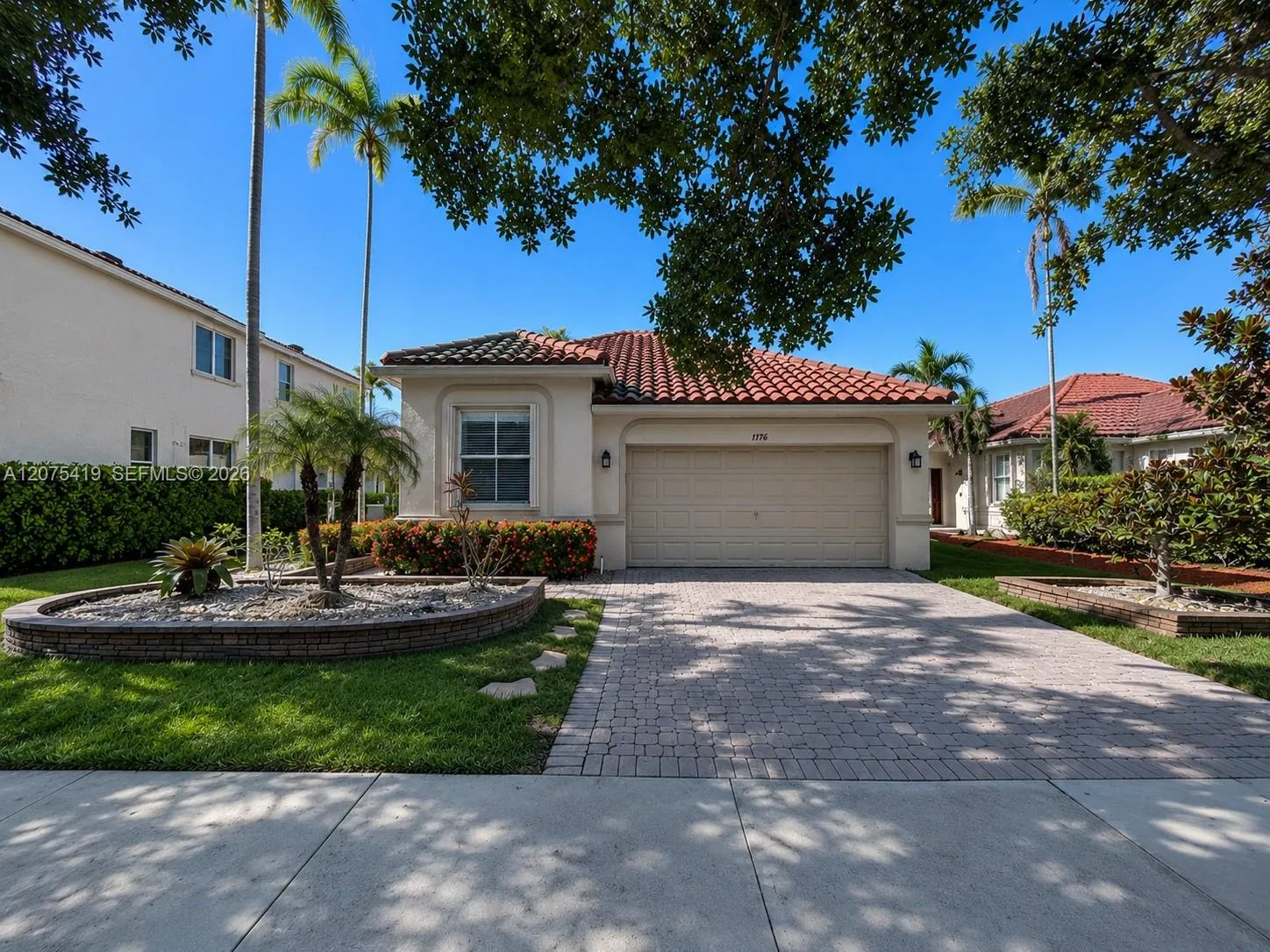 Foto de propiedad en 1776 Aspen Lane, Weston, FL 33327 Weston con MLS# 