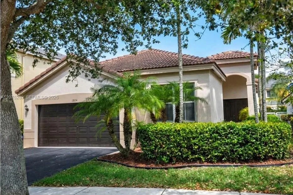 Foto de propiedad en 1804 Aspen Lane 0, Weston, FL 33327 Weston con MLS# 