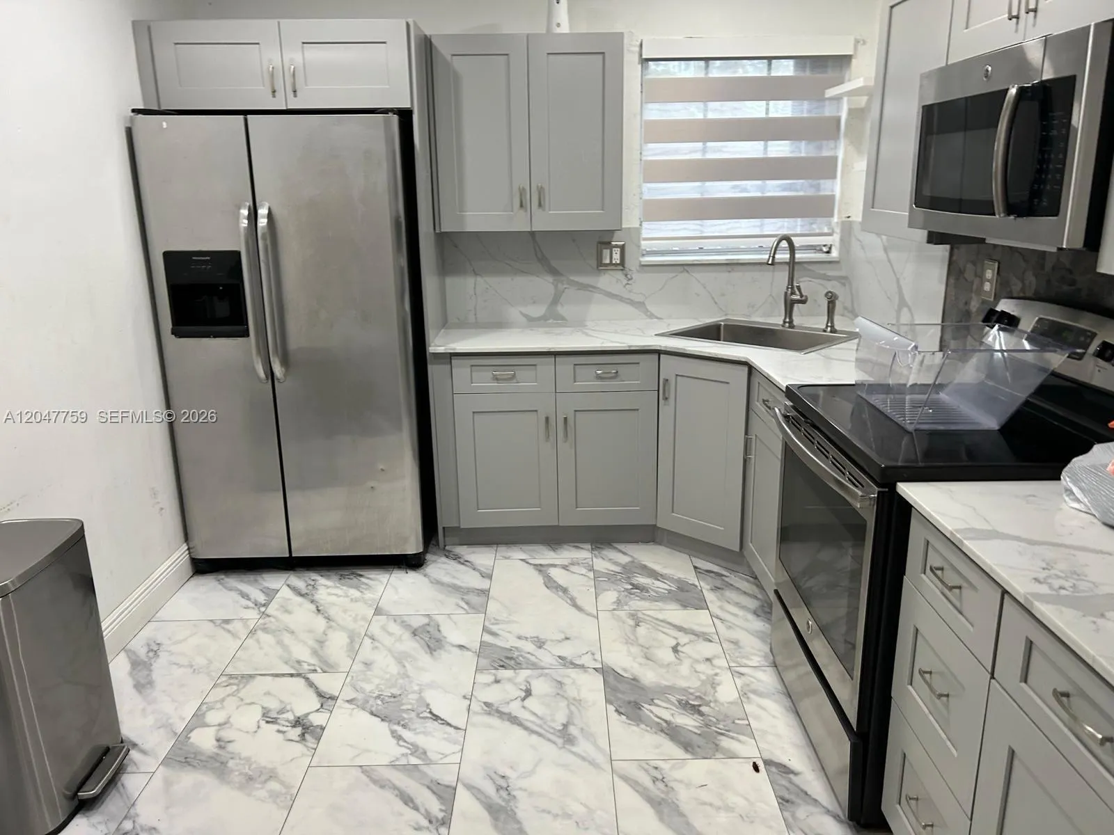 Foto de propiedad en 18130 NW 25th Avenue, Miami Gardens, FL 33056 Miami Gardens con MLS# 