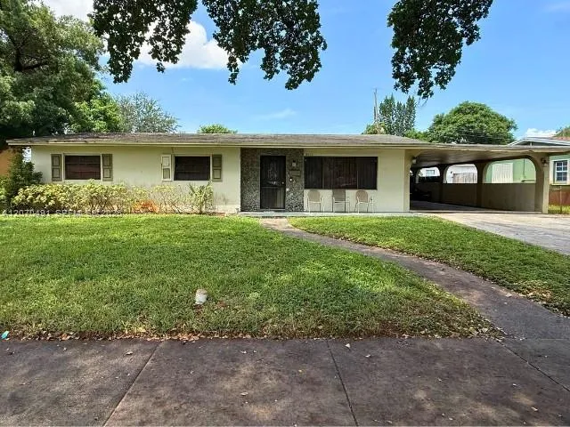 Foto de propiedad en 18600 NW 38th Court, Miami Gardens, FL 33055 Miami Gardens con MLS# 