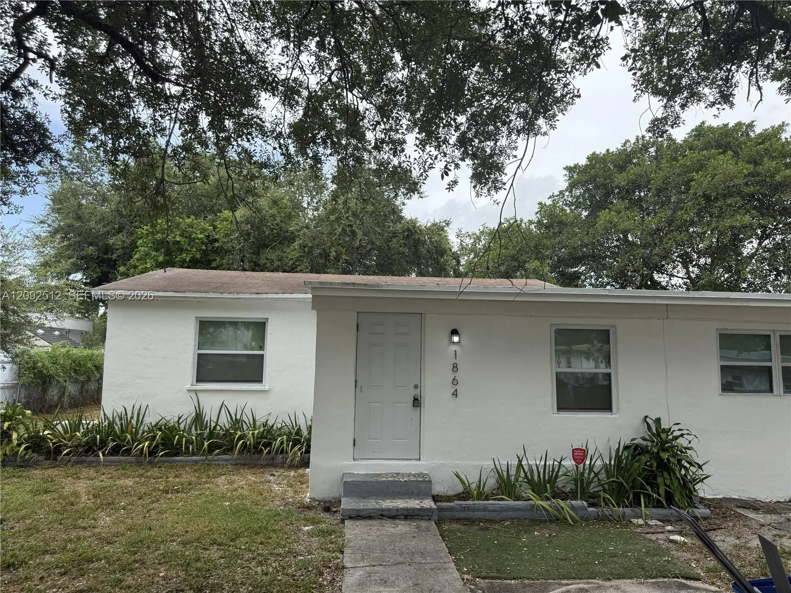 Foto de propiedad en 1864 NW 88th Terrace, Miami, FL 33147 Miami con MLS# 