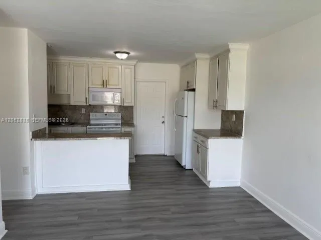 Foto de propiedad en 1870 NW 167 Street 1870, Miami Gardens, FL 33054 Miami Gardens con MLS# 