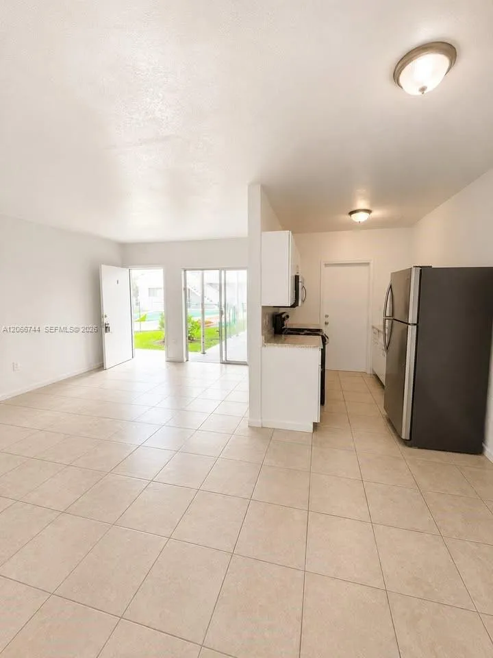 Foto de propiedad en 1951 NE 167th Street 5, North Miami Beach, FL 33162 North Miami Beach con MLS# 