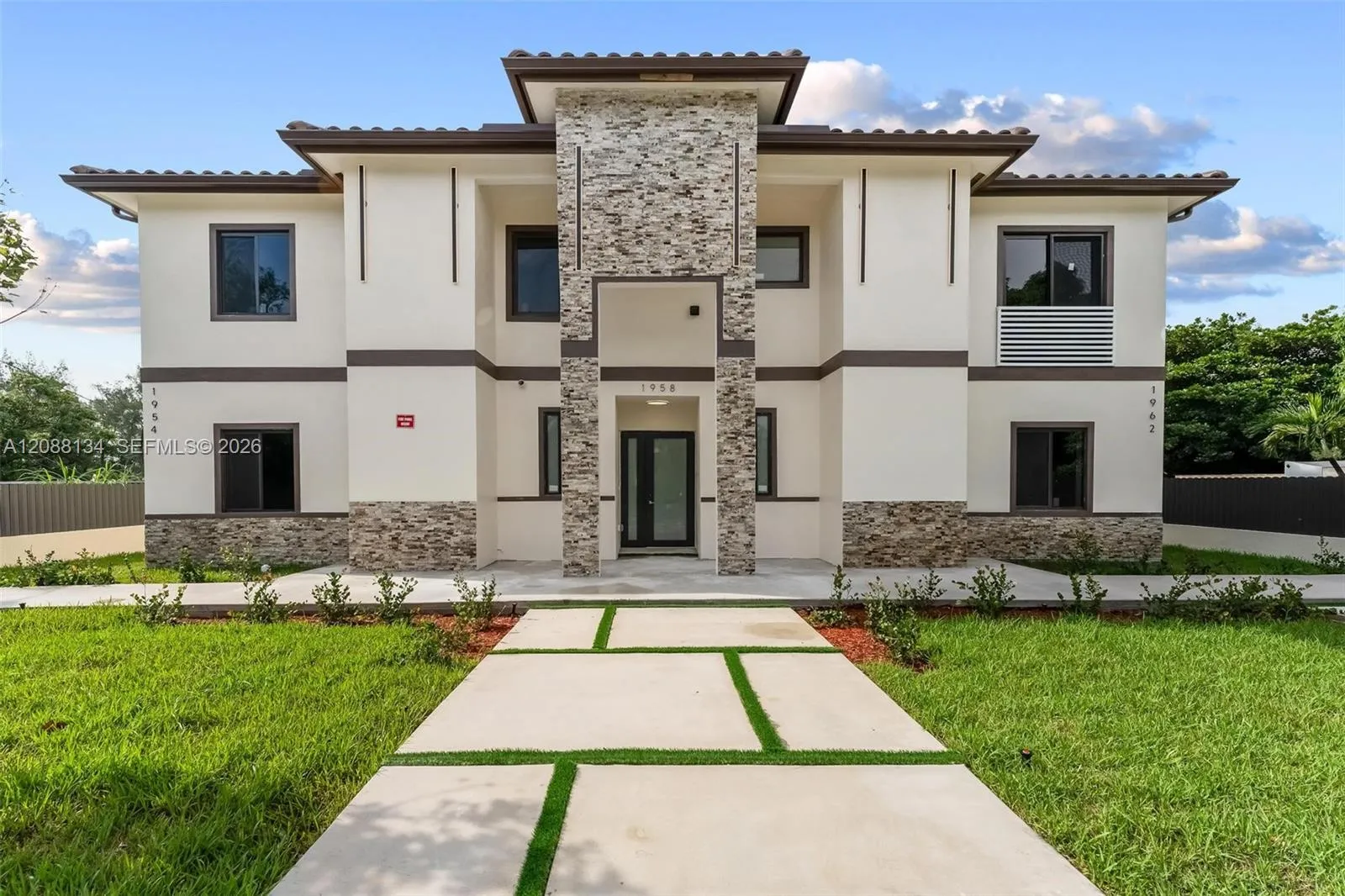 Foto de propiedad en 1962 NW 107th Street, Miami, FL 33167 Miami con MLS# 