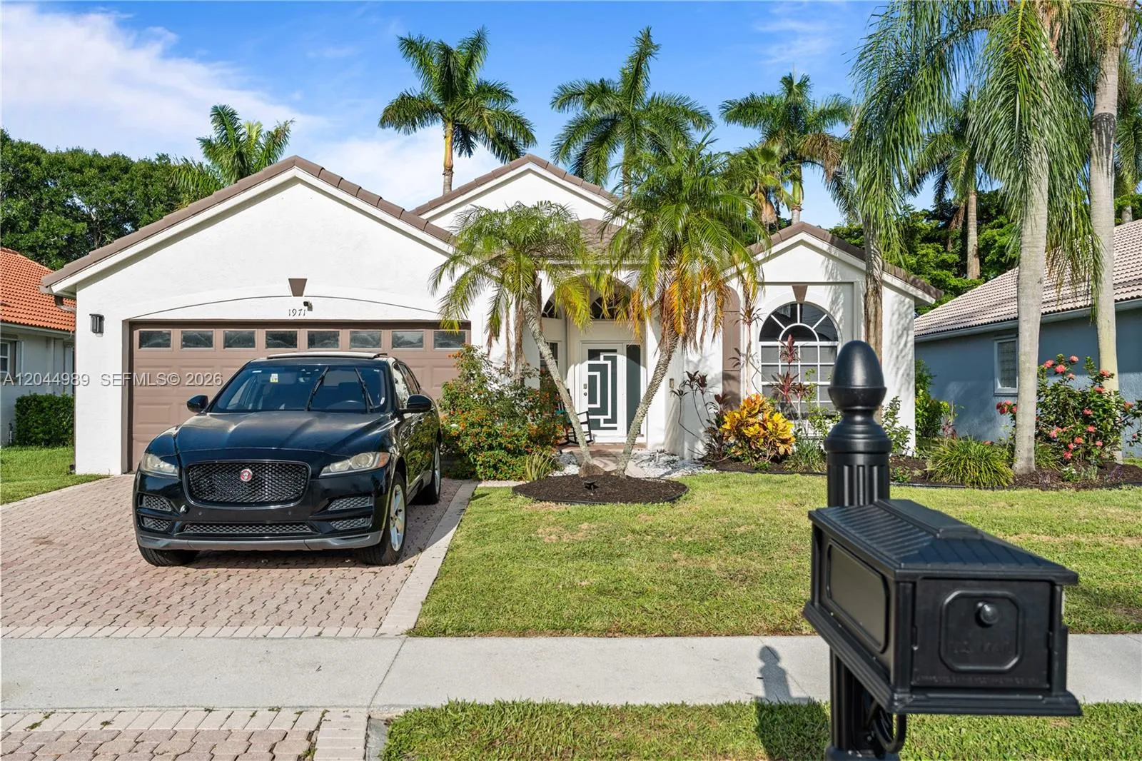 Foto de propiedad en 1971 Oak Berry Circle, Wellington, FL 33414 Wellington con MLS# 
