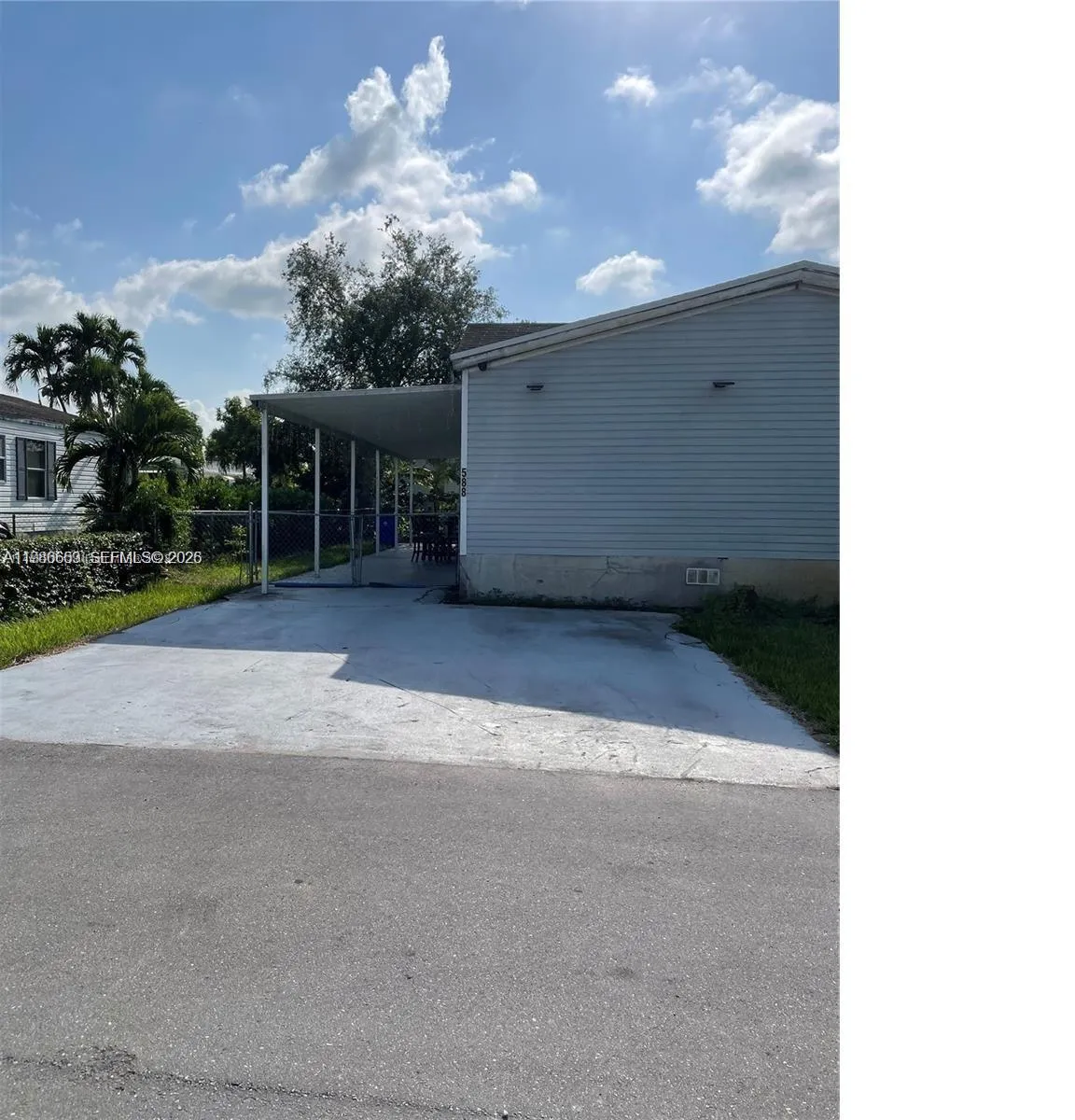 Foto de propiedad en 19800 SW 180 Th Avenue LOT 588, Miami, FL 33187 Miami con MLS# 