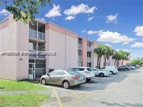 Foto de propiedad en 19805 SW 114th Avenue 219, Miami, FL 33157 Miami con MLS# 