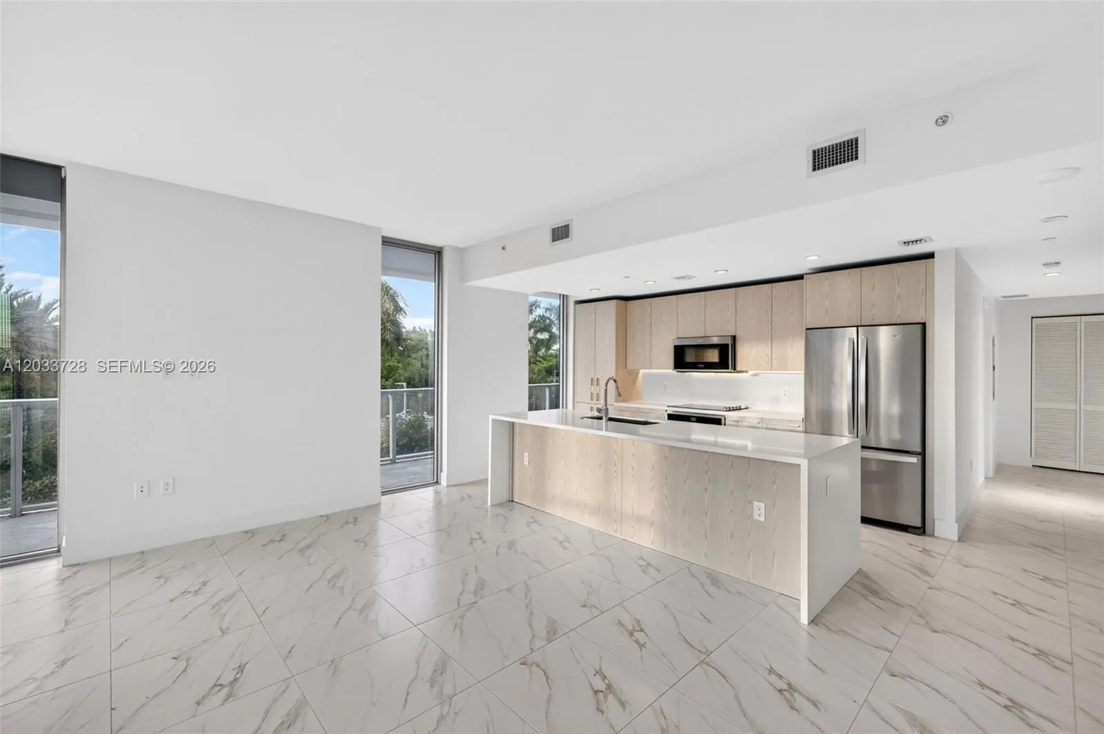 Foto de propiedad en 2000 Metropica Way 203, Sunrise, FL 33323 Sunrise con MLS# 