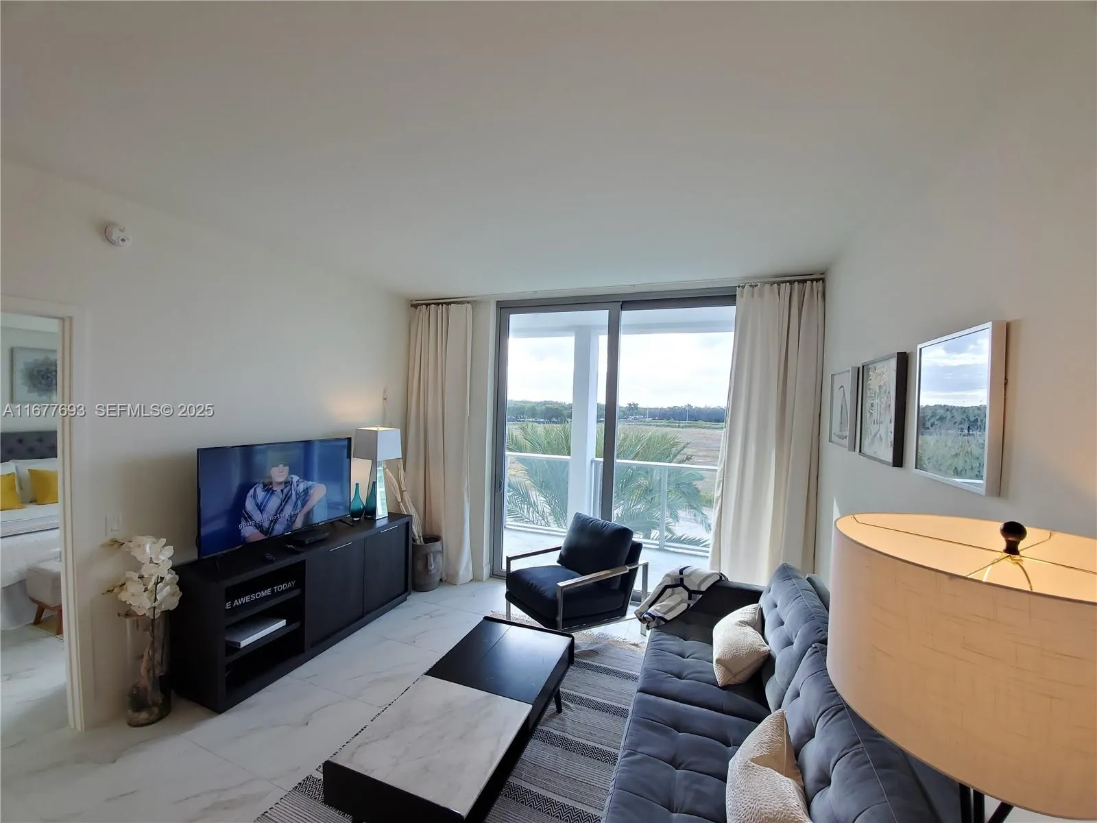 Foto de propiedad en 2000 Metropica Way 305, Sunrise, FL 33323 Sunrise con MLS# 