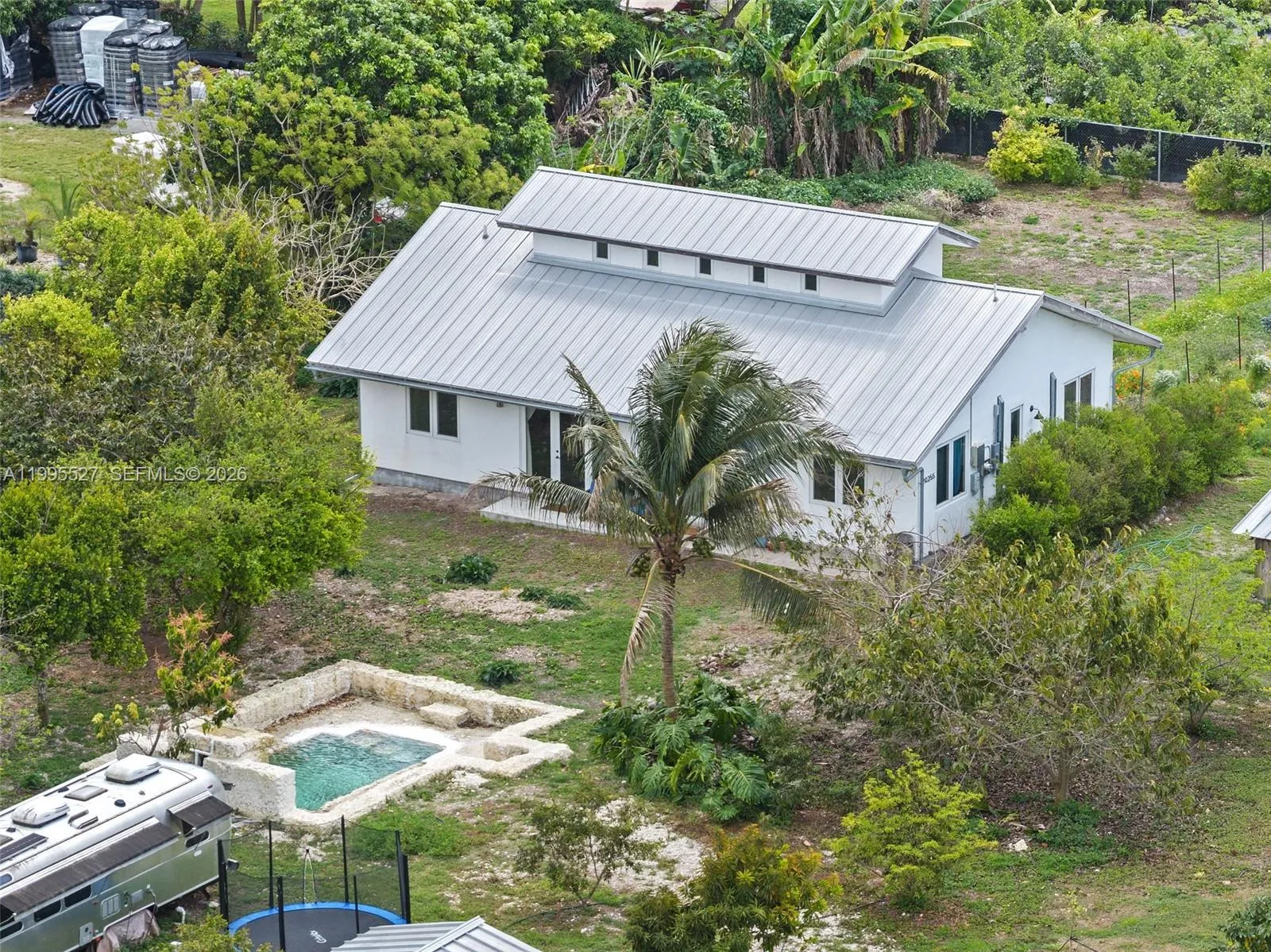 Foto de propiedad en 20255 SW 154th Avenue, Miami, FL 33187 Miami con MLS# 