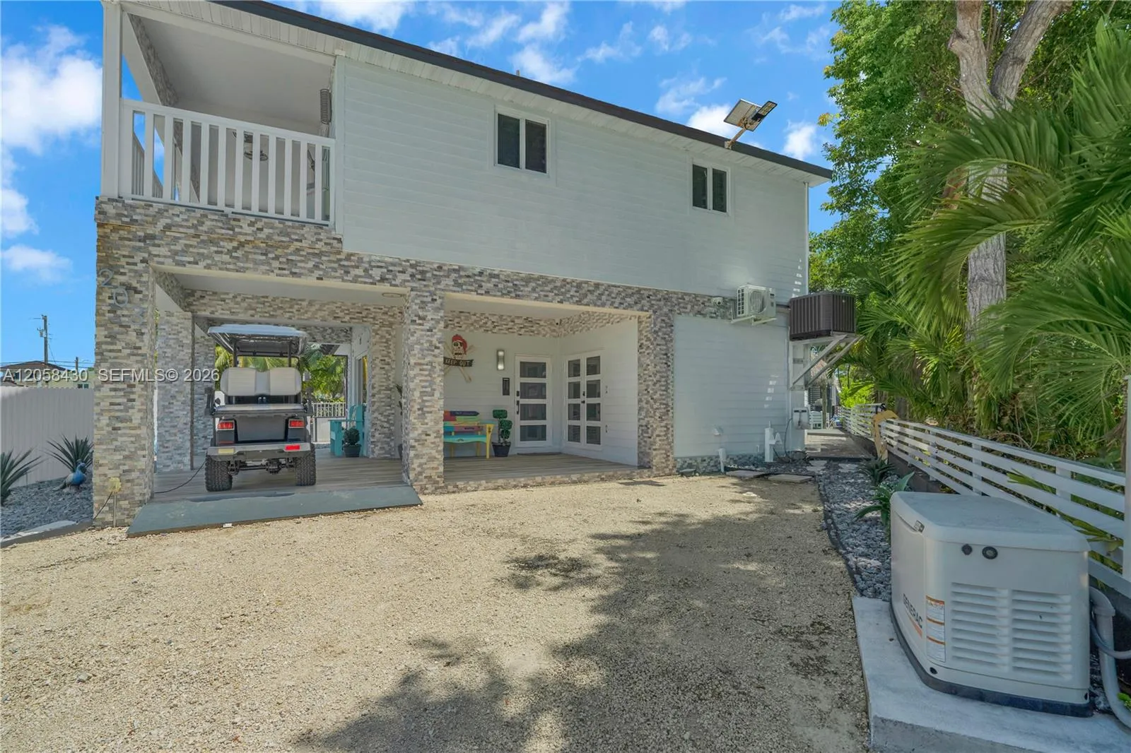 Foto de propiedad en 203 Pimilico Lane, Key Largo, FL 33037 Key Largo con MLS# 