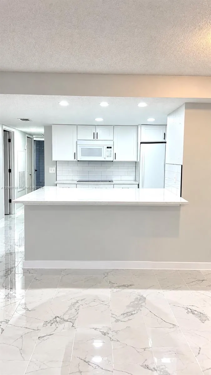Foto de propiedad en 2036 Royal Bay Boulevard 59, Kissimmee, FL 34746 Kissimmee con MLS# 