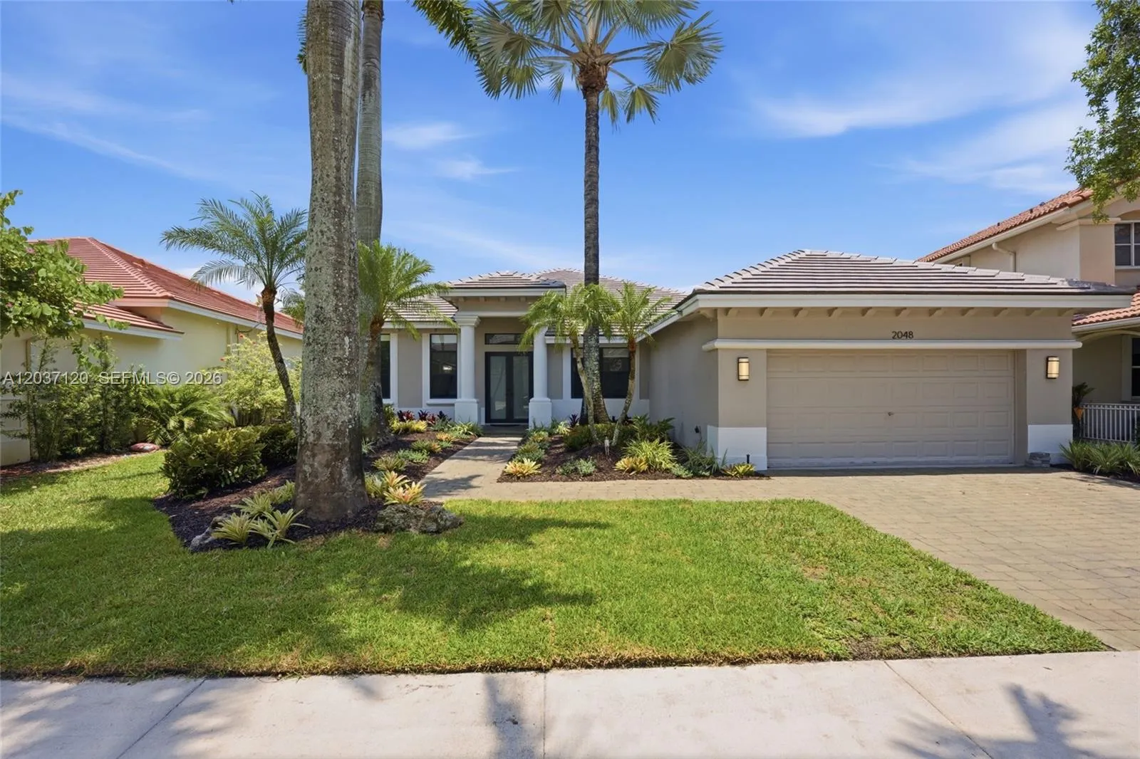 Foto de propiedad en 2048 Quail Roost Drive, Weston, FL 33327 Weston con MLS# 