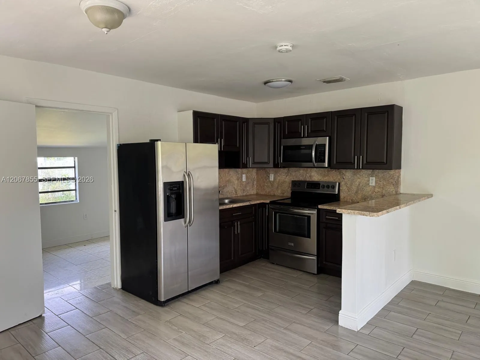 Foto de propiedad en 20535 NW 24th Avenue 20535, Miami Gardens, FL 33056 Miami Gardens con MLS# 