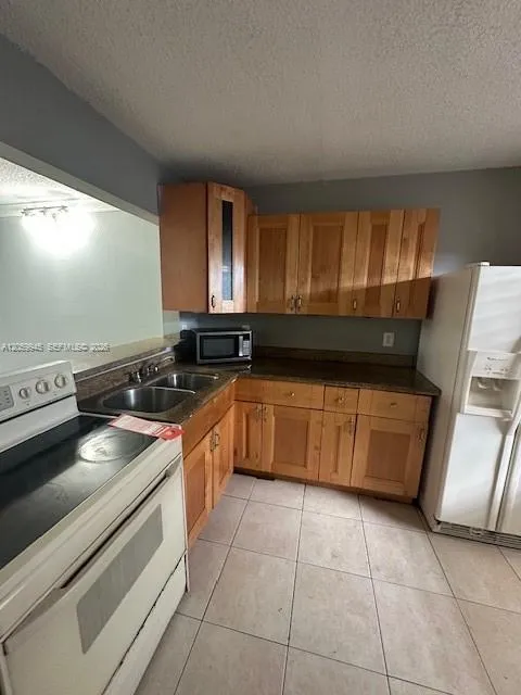 Foto de propiedad en 20800 NE 8th Court 105-17, Miami, FL 33179 Miami con MLS# 