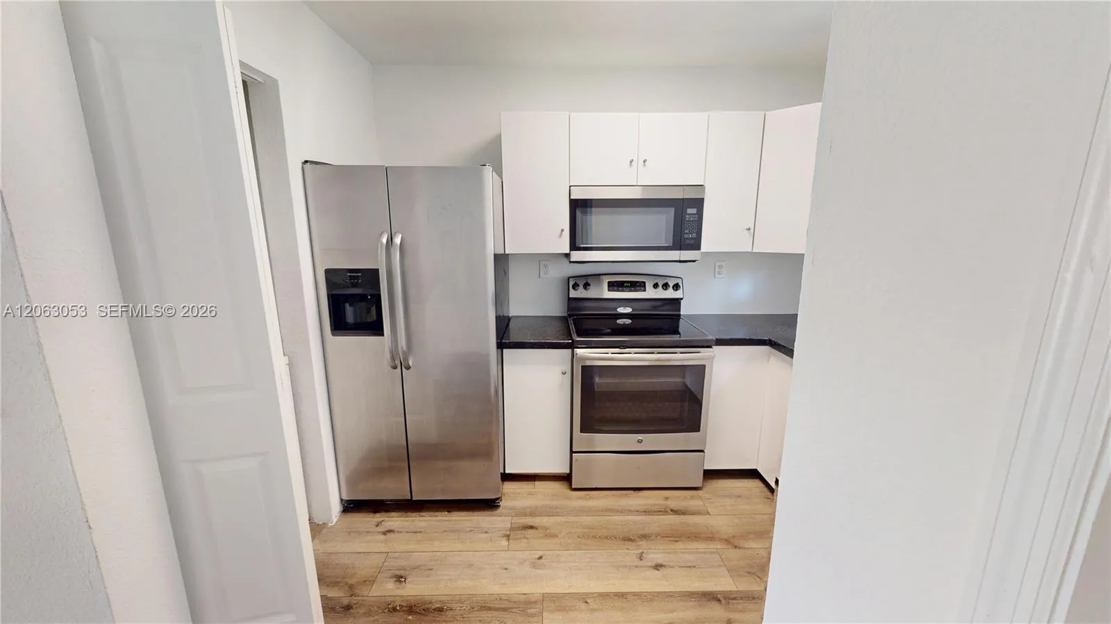 Foto de propiedad en 2084 NE 167th Street 2-102, North Miami Beach, FL 33162 North Miami Beach con MLS# 