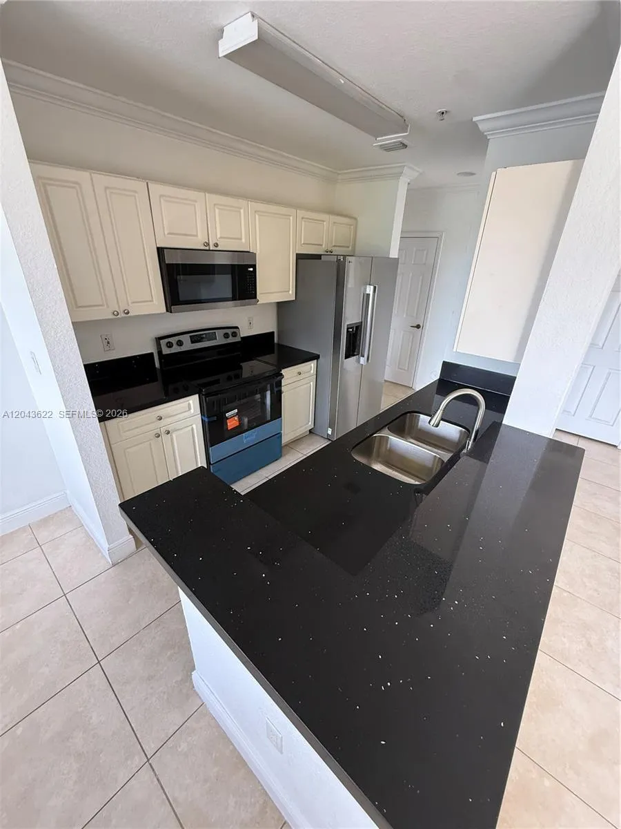 Foto de propiedad en 21100 SW 87th Avenue 304, Cutler Bay, FL 33189 Cutler Bay con MLS# 