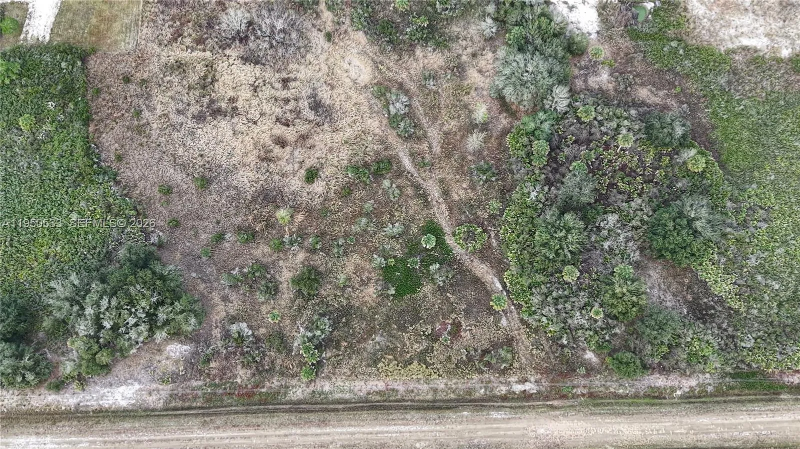 Foto de propiedad en 21867 NW 276th, Okeechobee, FL 34972 Okeechobee con MLS# 