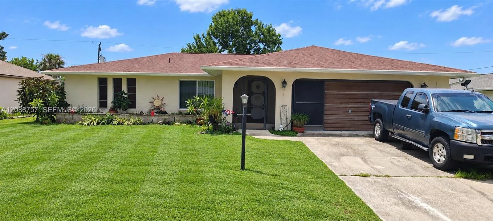 Foto de propiedad en 22199 Lancaster Avenue, Port Charlotte, FL 33952 Port Charlotte con MLS# 
