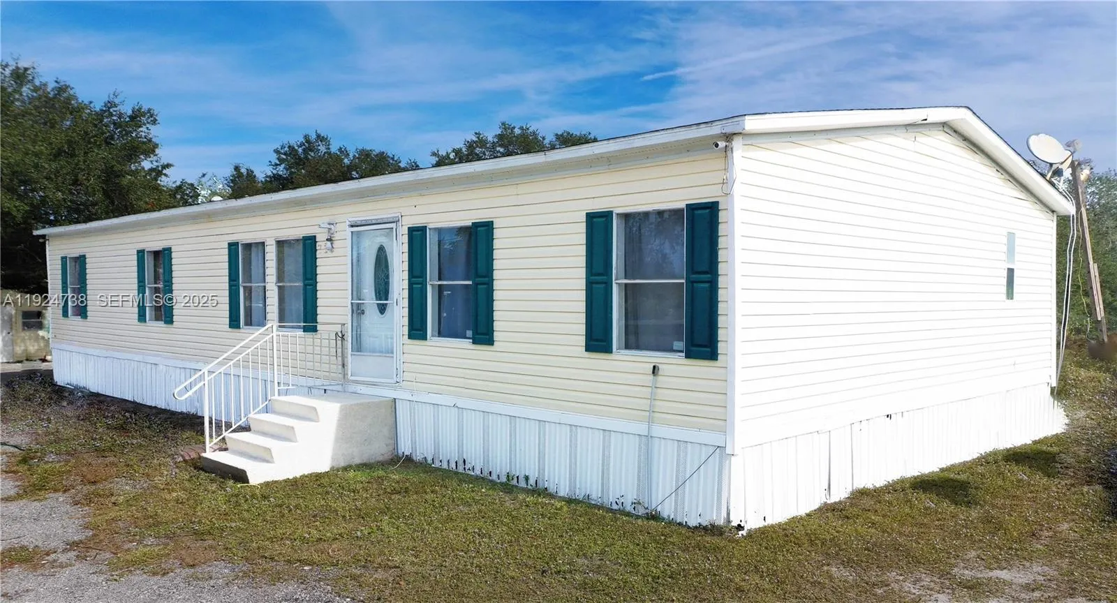 Foto de propiedad en 225 N Estribo Street, Clewiston, FL 33440 Clewiston con MLS# 