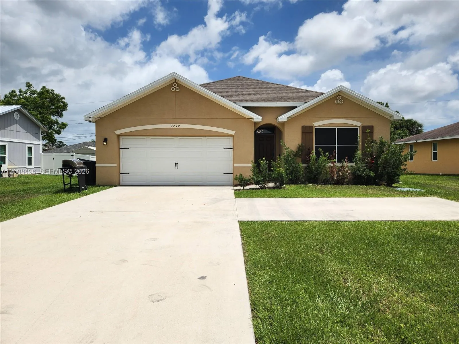 Foto de propiedad en 2257 SW Import Drive, Port St. Lucie, FL 34953 Port St. Lucie con MLS# 