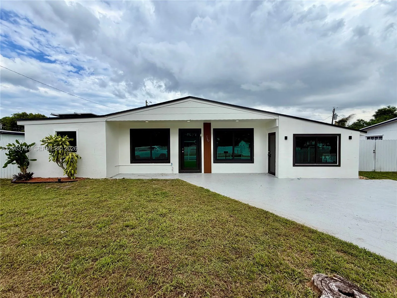 Foto de propiedad en 2310 NW 208th Street, Miami Gardens, FL 33056 Miami Gardens con MLS# 