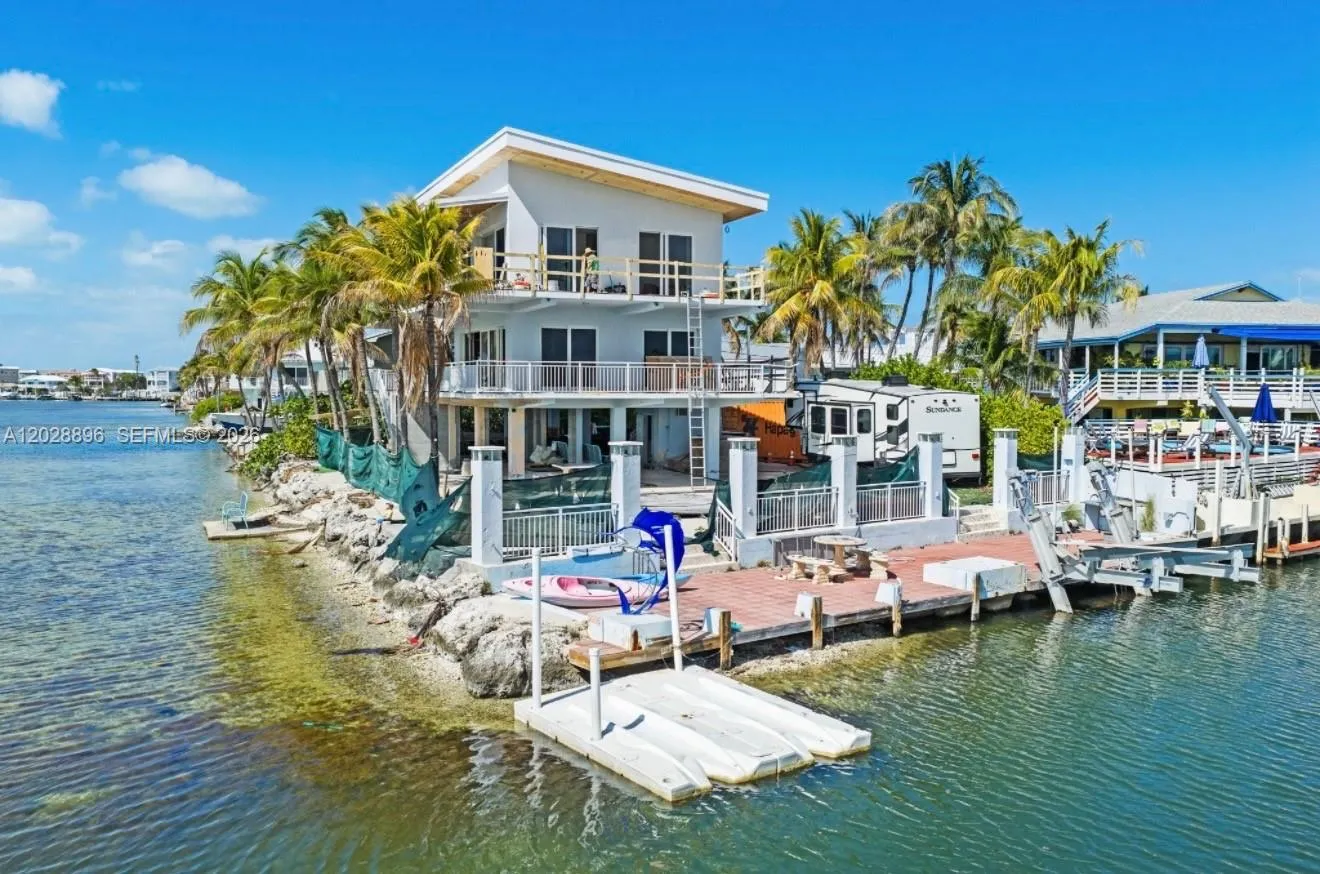 Foto de propiedad en 233 Aberdeen Court, Tavernier, FL 33070 Tavernier con MLS# 